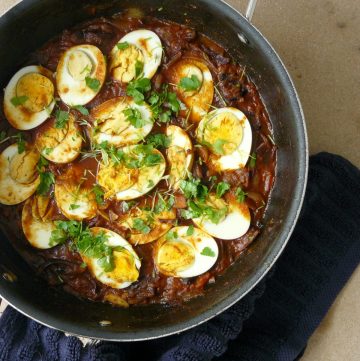Indian egg curry in a black pan