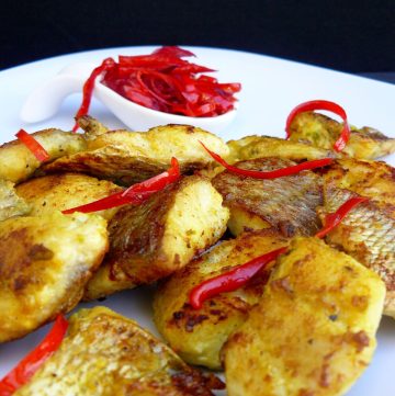Fried fish pieces served with chilli jam