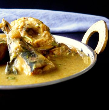 close up of fish curry in bowl