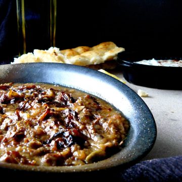 Indian lamb dish served in black plate