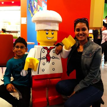 Woman and child near Lego model
